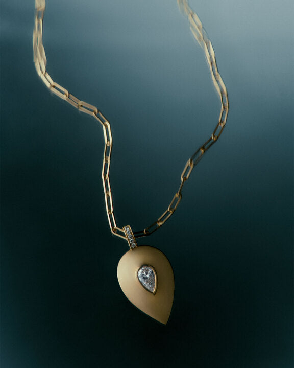 Isis Ocean Drop Diamond Pendant - Nisi Jewelry - Delux Jewels Luxury jewelry Fine jewelry Designer jewelry High-end jewelry Premium jewelry Elegant jewelry Diamond rings Gold necklaces Gemstone earrings Luxury bracelets Statement jewelry Wedding bands Engagement rings Custom jewelry Buy luxury jewelry online Affordable luxury jewelry Handmade fine jewelry Jewelry for gifts Unique jewelry pieces Jewelry store online